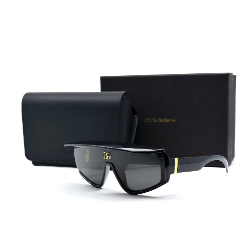 Black sunglasses with gold accents on a white background, featuring Dolce & Gabbana logo.