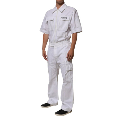 Person wearing a white coverall on a white background