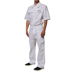 Person wearing a white coverall on a white background