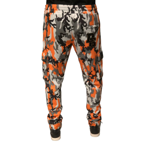 Camouflage pants with orange, gray, and black pattern on a white background
