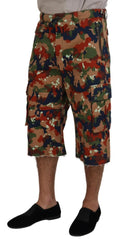 Camouflage shorts worn by a person on a white background