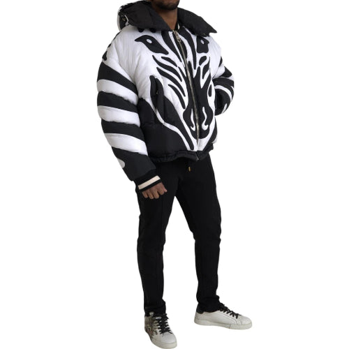 Person wearing a zebra-striped jacket on a white background
