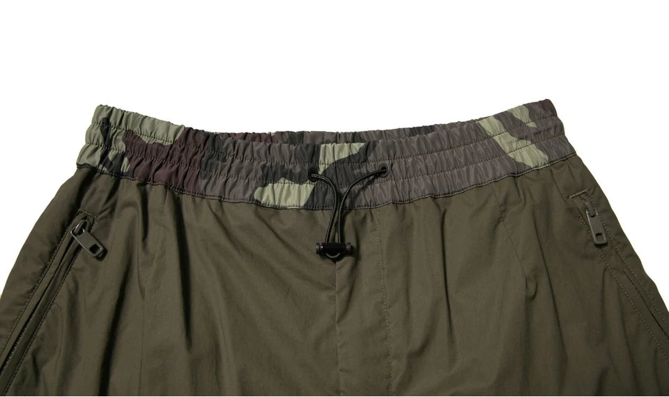 Dark green pants on a white background