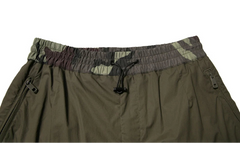 Dark green pants on a white background