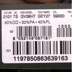 Close-up of a product with a barcode and text on a dark background