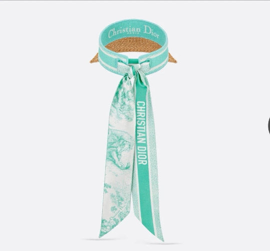 Turquoise Christian Dior scarf with logo on a white background