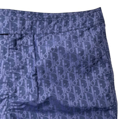 Blue shorts with a patterned design on a white background