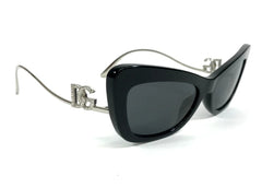 Black sunglasses with silver frame on a white background