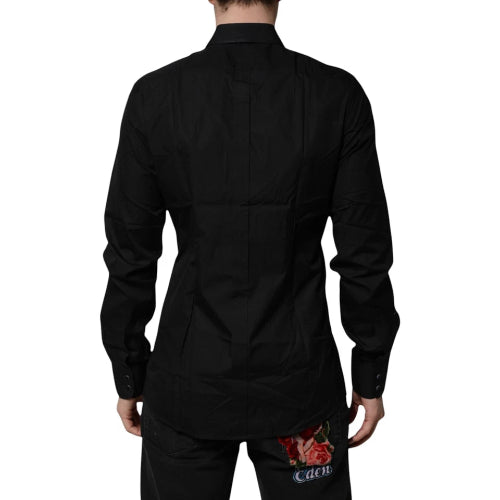 Black chef coat with floral design on the back pocket on a white background