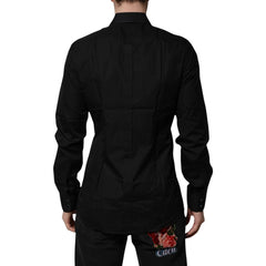 Black chef coat with floral design on the back pocket on a white background
