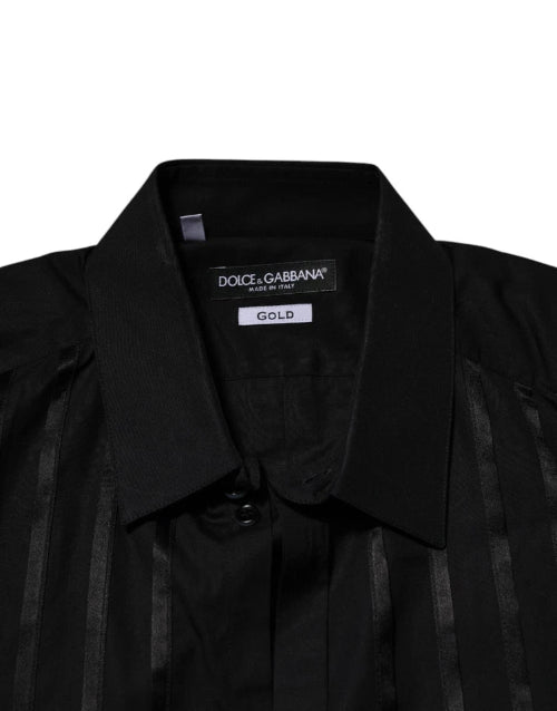 Black garment with Dolce & Gabbana label on a white background
