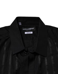 Black garment with Dolce & Gabbana label on a white background