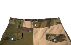Camouflage-patterned pants with a brand label on a white background