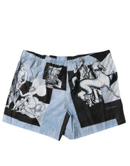 Denim shorts with artistic designs on a white background