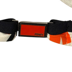 Black belt with red and orange accents on a white background