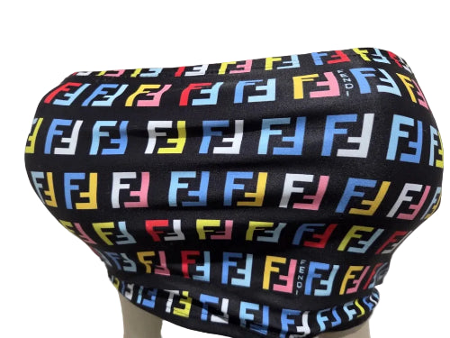 Black tube top with colorful logo pattern on a mannequin against a white background
