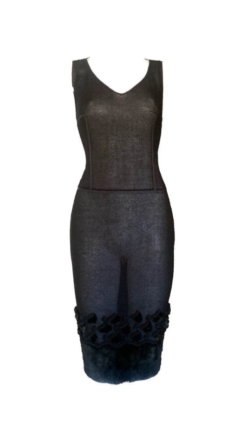 Black sleeveless dress with floral details on a white background