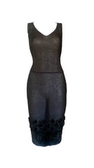 Black sleeveless dress with floral details on a white background