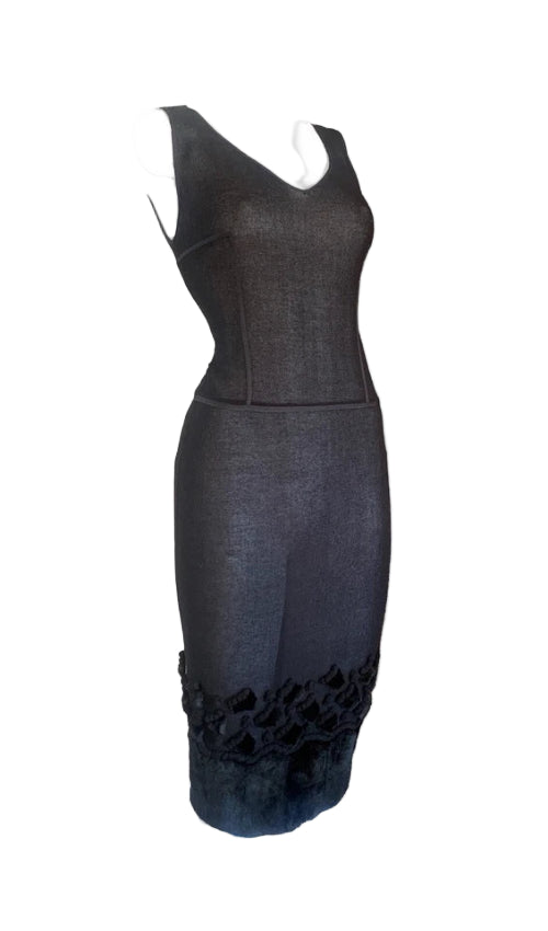 Black dress with leopard print hem on a white background