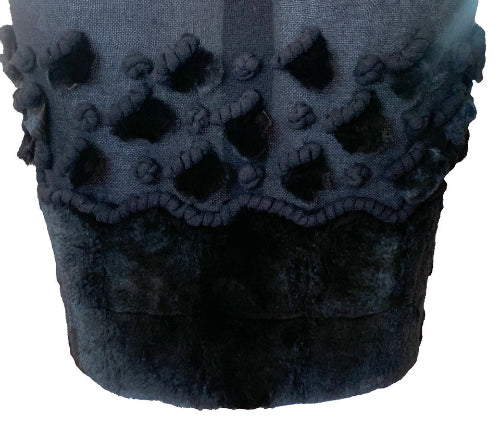 Dark blue fabric with textured pattern on a white background