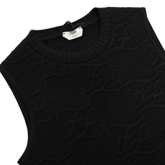 Black sweater on a wooden surface
