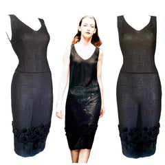 Black dress with lace details on a model against a blurred background