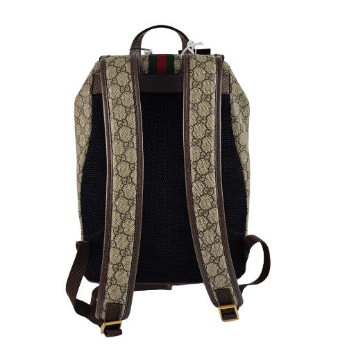 Backpack with patterned straps on a light gray background