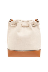 Beige bucket bag with brown leather trim on a white background
