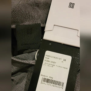 Gray Givenchy top with brand label and packaging