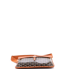 Designer handbag with patterned flap and orange border on a white background