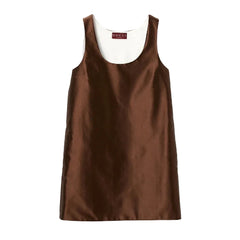Brown dress with white lining on a gray background