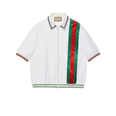 White jacket with red and green striped accents on a light gray background