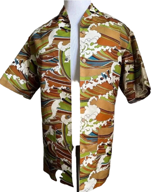 Camouflage-patterned shirt with a collar on a plain background