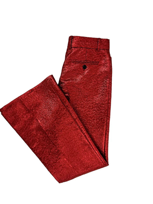 A pair of metallic red trousers folded neatly on a solid white background, showcasing a textured, shimmering finish.