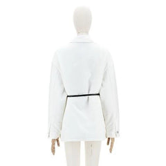 White blazer on a mannequin against a white background