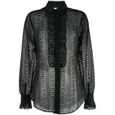 Black and white patterned blouse with lace trim