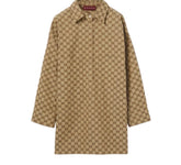 A Gucci GG Supreme long-sleeve shirt jacket in beige and brown, featuring the brand's signature monogram pattern and a half-zip front, shown against a light gray background.