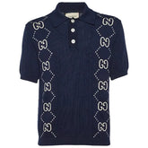 Navy blue polo shirt with Gucci logo design on a white background