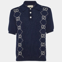 Navy blue polo shirt with Gucci logo design on a white background