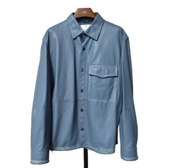 Blue shirt on a hanger against a white background