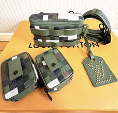 Louis Vuitton bag set with patterned pouches and a tag on a wooden surface.