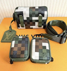 Checkered bags and accessories on a beige surface with visible brand name.