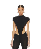 Black outfit with cut-out design on a white background