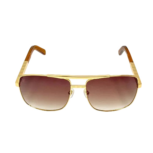 Gold-framed sunglasses with brown gradient lenses on a white background