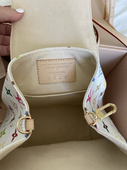 Louis Vuitton handbag with colorful interior pattern and visible brand logo.