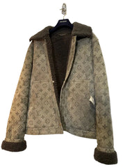 Beige jacket with monogram pattern on a white background