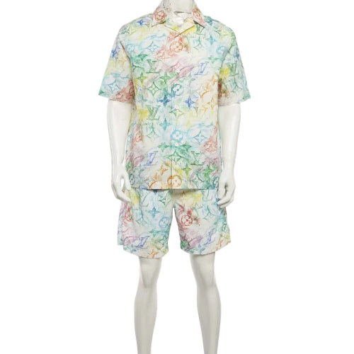 Mannequin wearing a colorful patterned shirt and shorts set on a white background