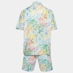 Colorful patterned shirt and shorts set on a white background
