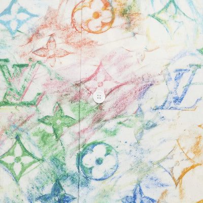 Colorful patterned fabric with a button in the center