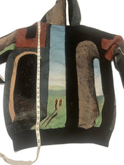 Colorful patterned fabric on a mannequin with a measuring tape, on a white background